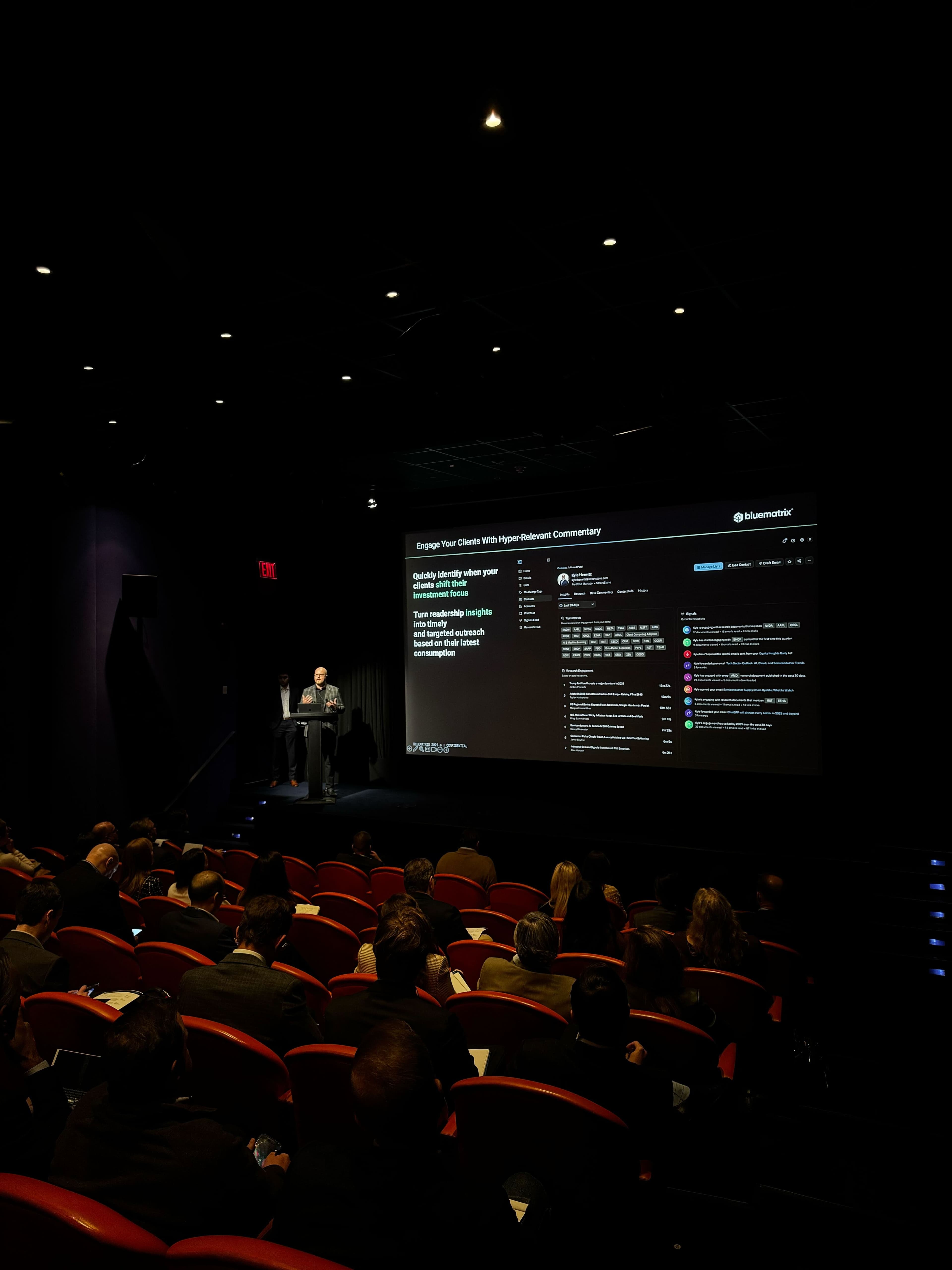 Presenting on stage at a conference in New York